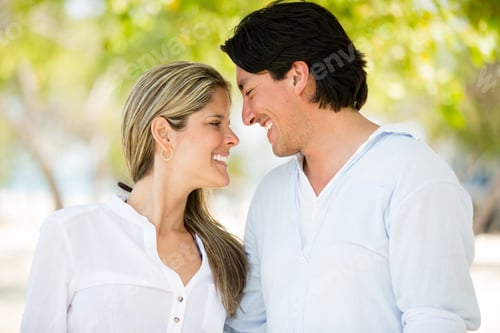 Preview: Cute Couple In Love Walking Outdoors And Looking Happy