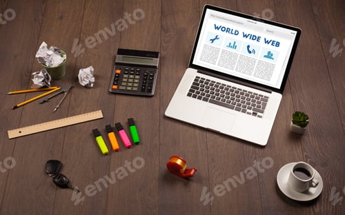 Preview: Laptop Computer On Wooden Desk With Office Suplies