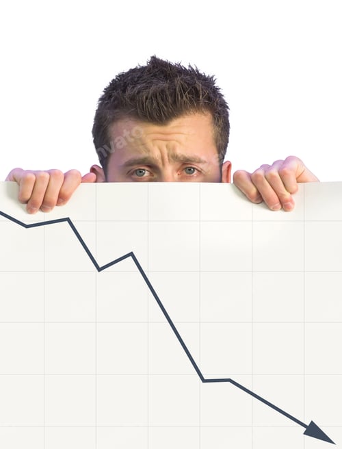Preview: Dissapointed Business Man Holding A Card With A Graph Going Down