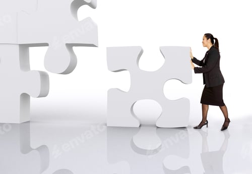 Preview: Asian Business Woman Building A Puzzle Over A White Background