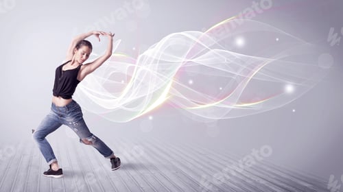 Preview: A Beautiful Young Hip Hop Dancer Dancing Contemporary Urban Street Dance In Front Of Grey Wall