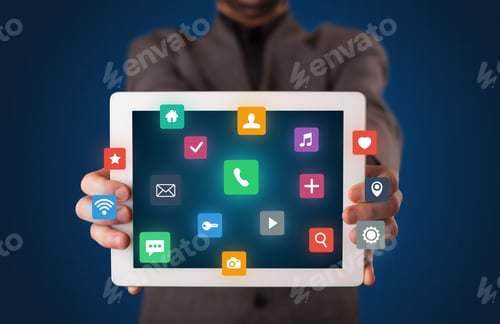 Preview: Businessman Holding Tablet With Colorful Applications