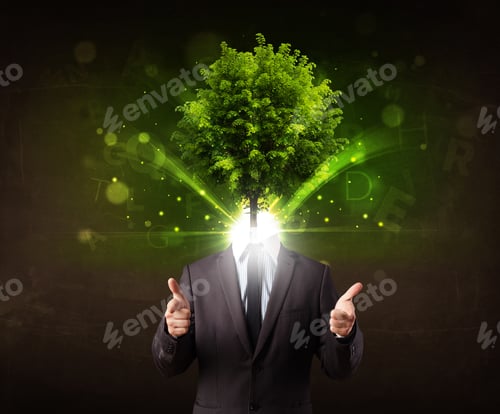 Preview: Man With Green Tree Head Concept On Brown Background