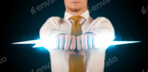 Preview: Business Man Holding Glowing Lightning Bolt In His Hands Concept