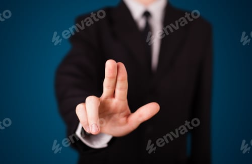 Preview: Young Businessman Pressing Imaginary Button