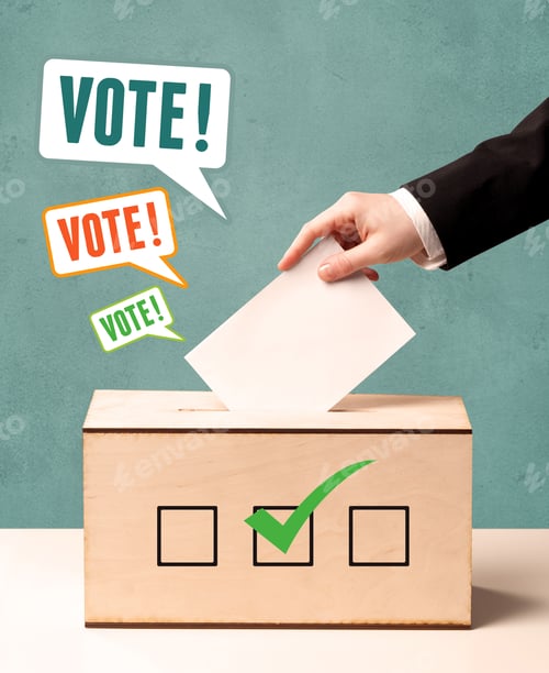 Preview: A Hand Placing A Voting Slip Into A Ballot Box