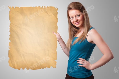 Preview: Beautiful Young Girl Presenting Old Paper Copy Space