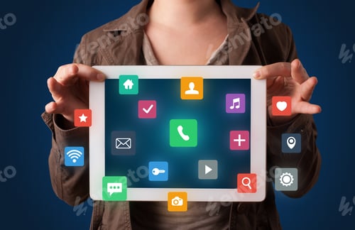 Preview: Casual Young Woman Holding Tablet With Colorful Applications