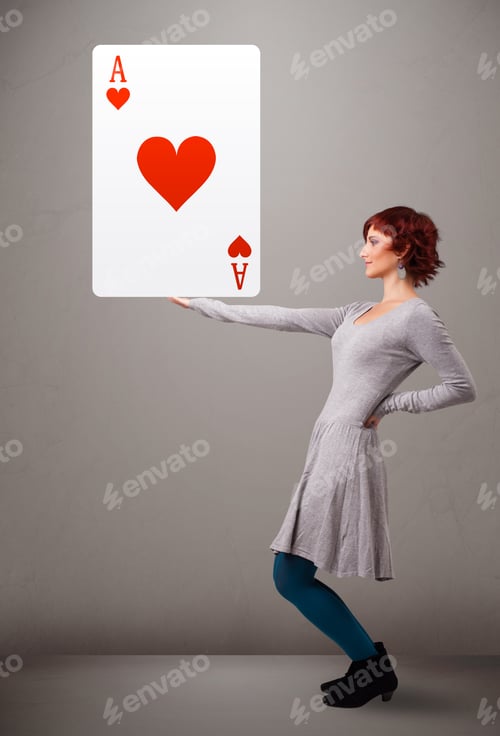 Preview: Beautiful Young Woman Holding Red Heart Ace