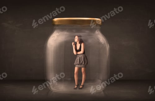 Preview: Businesswoman Captured In A Glass Jar Concept Concept On Background