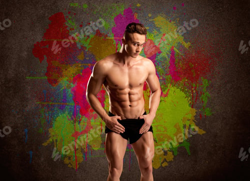 Preview: A Muscular Young Bodybuilder Lifting Weight And Showing His Hot Body With Muscles In Front Of An