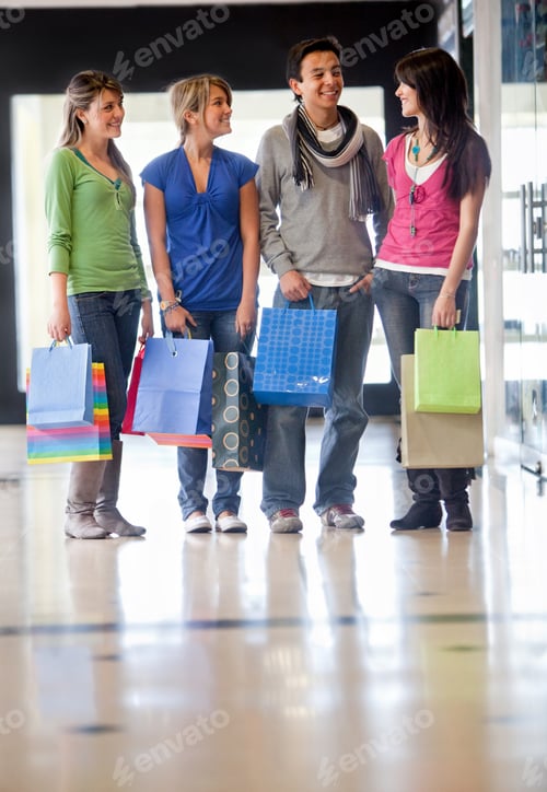 Preview: Group Of Friends Shopping In A Mall With Some Bags