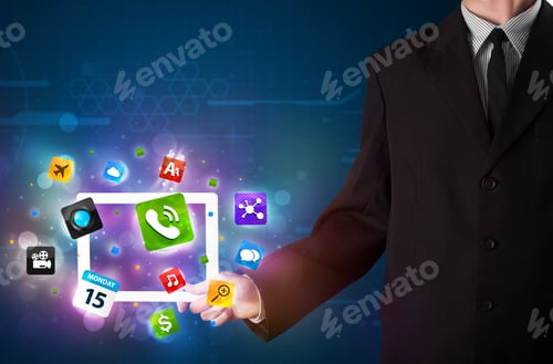 Preview: Young Businessman Holding A Tablet With Modern Colorful Apps And Icons