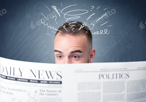 Preview: Confused Businessman Holding Newspaper