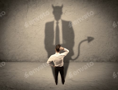 Preview: An Experienced Tricky Businessman In Suit Looking At His Devil Desguise Shadow Reflected On The