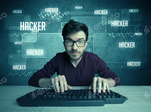 Preview: A Young Handsome Nerd Hacking Internet Web Sites While Working On Computer Keyboard, With Digital