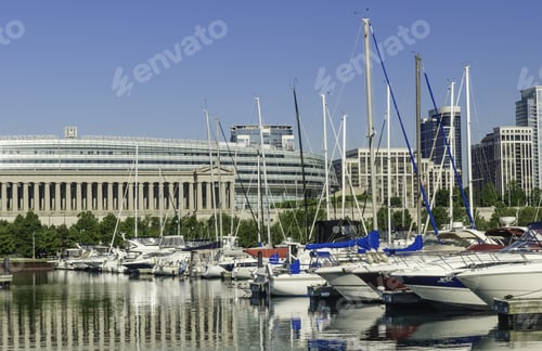 Preview: Urban Magnetism: Row Of Yachts Docked In Burnham Harbor By Soldier Field, Home Of The Chicago Bears