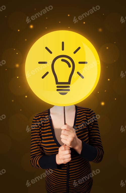 Preview: Casual Young Woman Holding Round Sign With Yellow Lightbulb