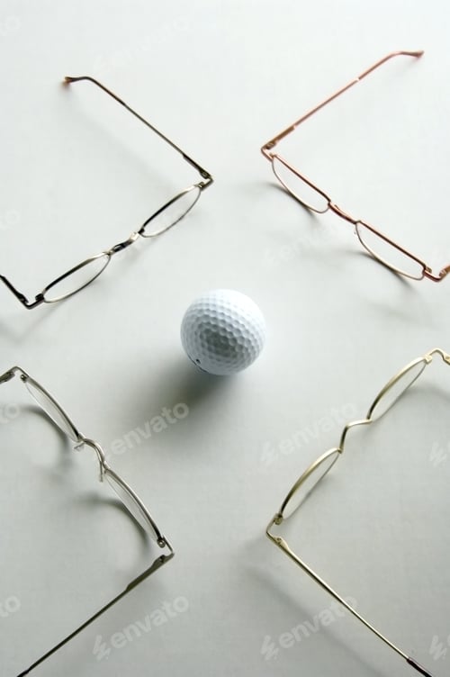 Preview: Golf Ball Surrounded By Reading Glasses