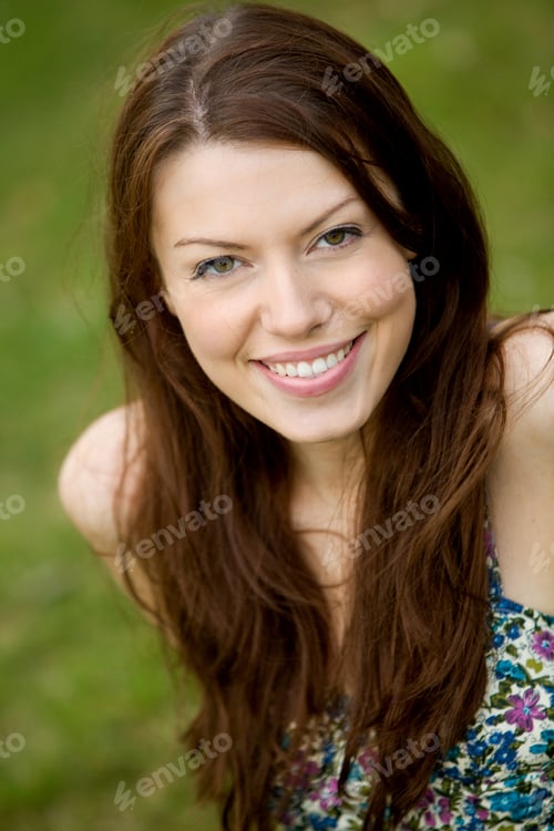 Preview: Portrait Of A Beautiful Casual Woman Smiling Outdoors
