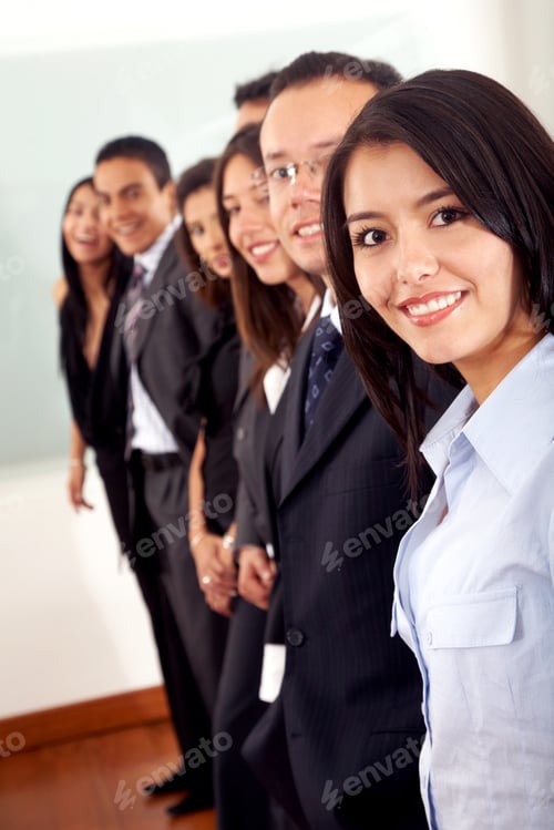 Preview: Business Team In An Office With A Businesswoman Leading