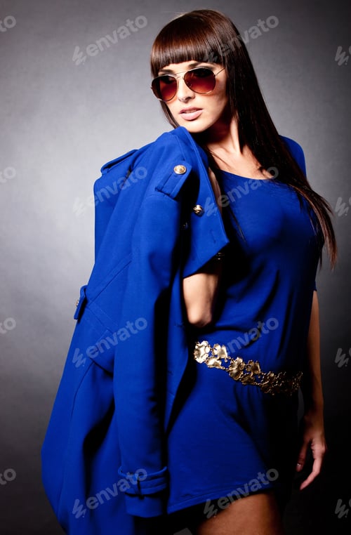 Preview: Fashion Woman In Blue Holding A Coat