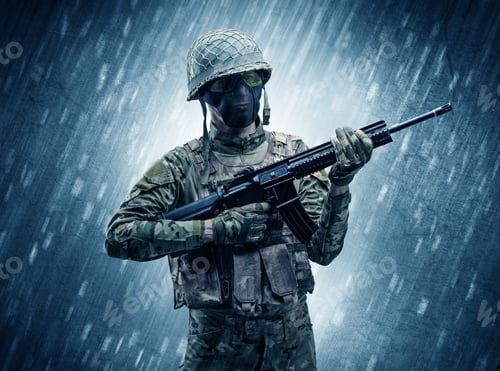 Preview: Armed Soldier Standing In Rainy Weather