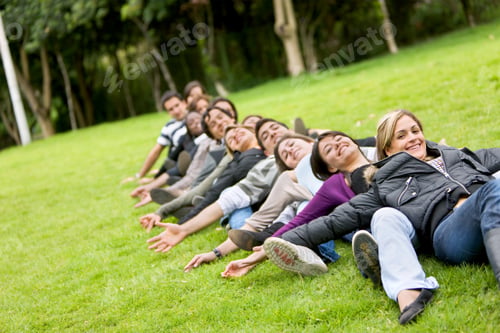 Preview: Happy Group Of Friends Smiling Outdoors In A Park