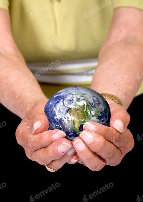 Preview: Hands Of An Eldery Woman Holding An Earth Globe - Globe Is From Http://Www.Nasa.Gov