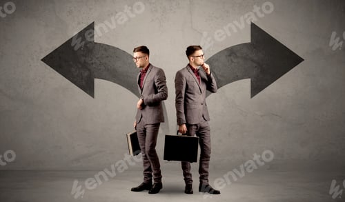 Preview: Young Conflicted Businessman Choosing Between Two Directions Represented By Black Arrows