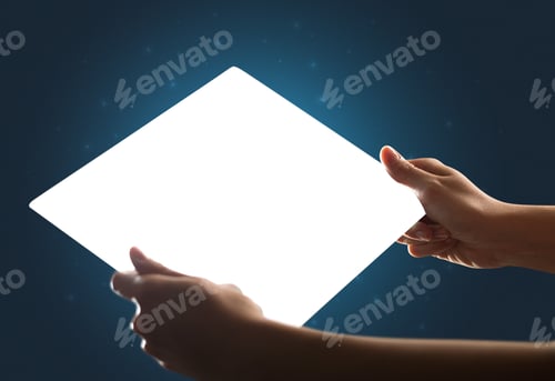 Preview: Young Female Hand Holding And Touching A Piece Of Glass Meant To Look Like A Tablet