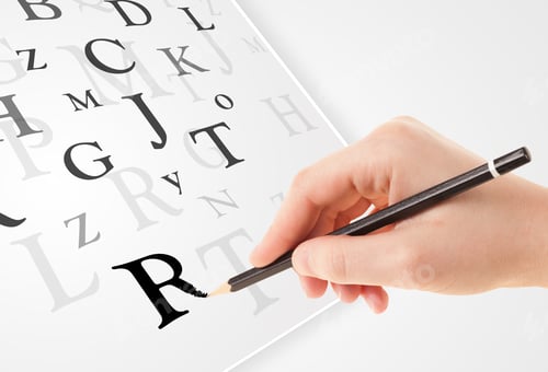 Preview: Human Hand Writing Various Letters On White Plain Paper
