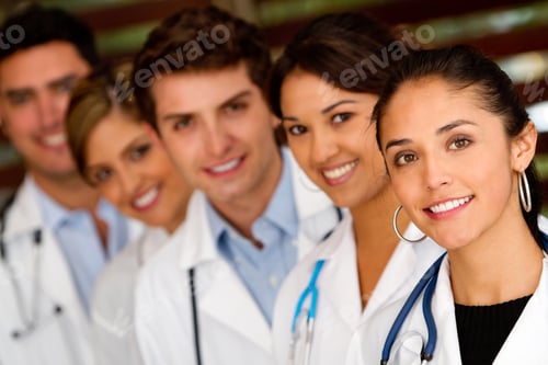 Preview: Friendly Group Of Doctors In A Row At The Hospital