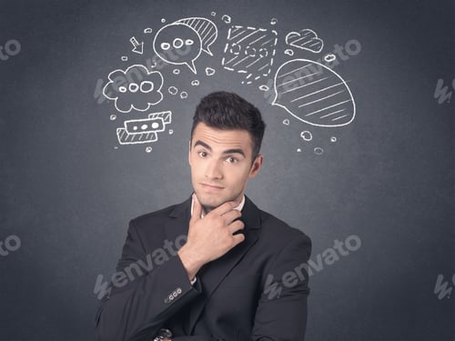 Preview: Young Businessman With Drawn Speech Bubbles Over His Head