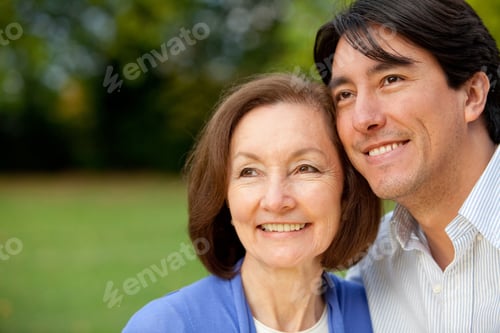 Preview: Portrait Of A Mother And Son Smiling Outdoors