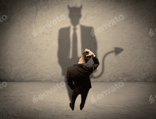 Preview: An Experienced Tricky Businessman In Suit Looking At His Devil Desguise Shadow Reflected On The