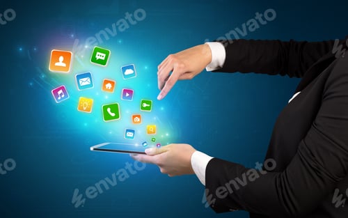 Preview: Hand Holding Tablet And Application Icons Falling Inwards