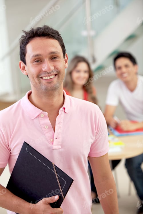 Preview: Male Student Studying At Home With A Notebook