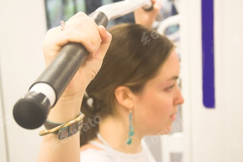 Preview: Beautiful Woman Puling Weights