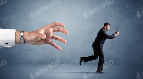 Preview: Young Miniature Businessman Running From A Big Hand