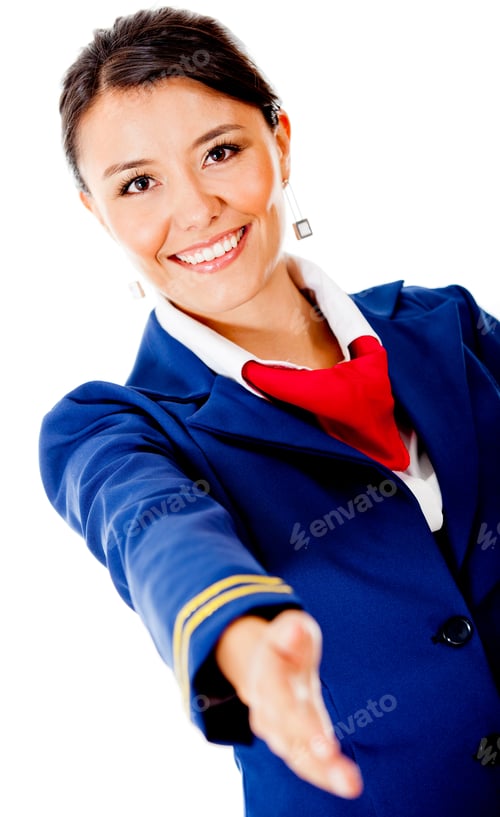 Preview: Welcoming Air Hostess With Hand Extended �¢?? Isolated Over A White Background