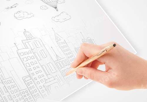 Preview: A Person Drawing Sketch Of A City With Balloons And Clouds On A Plain Paper