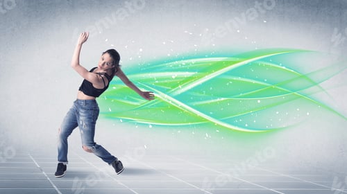 Preview: A Good Looking Fresh Street Dancer Dancing In Front Of Grey Background With White And Bright