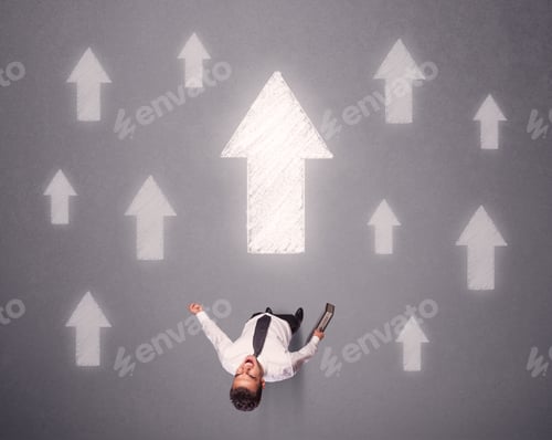 Preview: Young Contemplating Businessman Stands In Front Of White Arrows