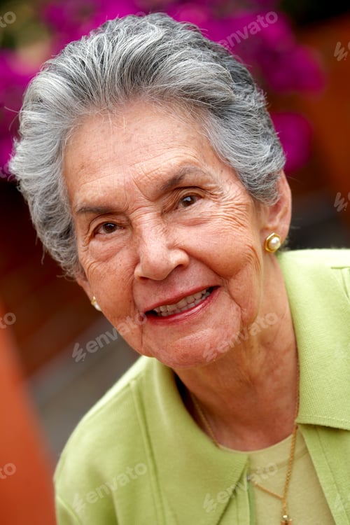 Preview: Senior Woman Portrait Smiling Outdoors
