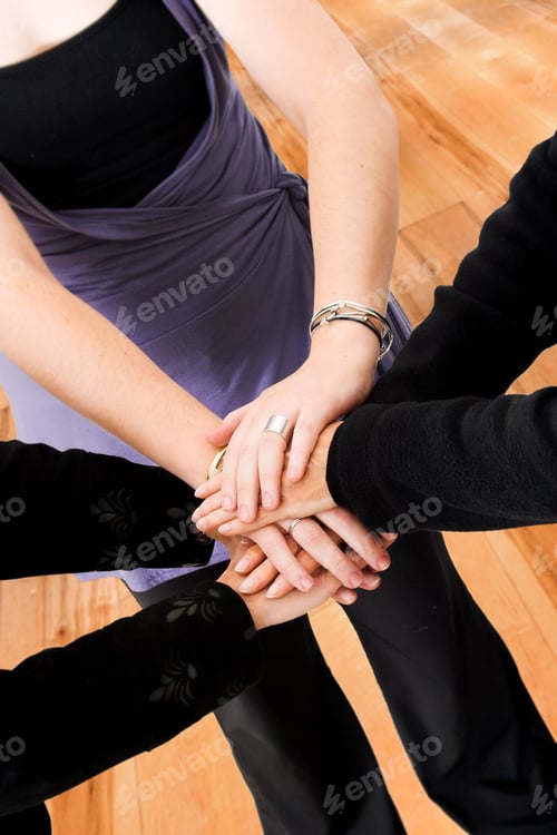 Preview: Business Hands Together Representing Teamwork In An Office Environment