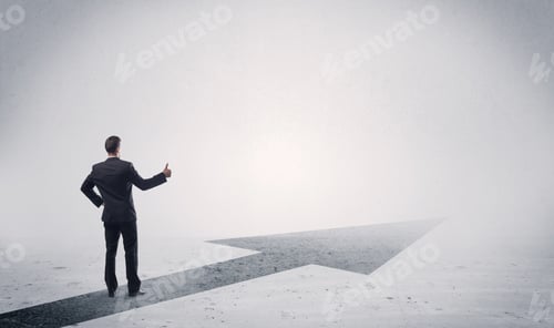 Preview: A Professional Businessman Thinking While Standing On A Black Arrow Pointing Forward In Grey Space