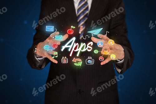Preview: Businessman With Drawn Application Icons And Symbols In His Hands