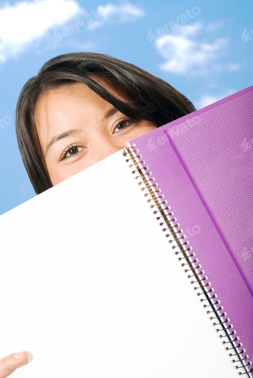 Preview: Beautiful Student With Notebook At University