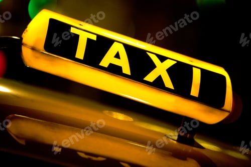 Preview: Taxi Cab At Night With The Sign Lit
